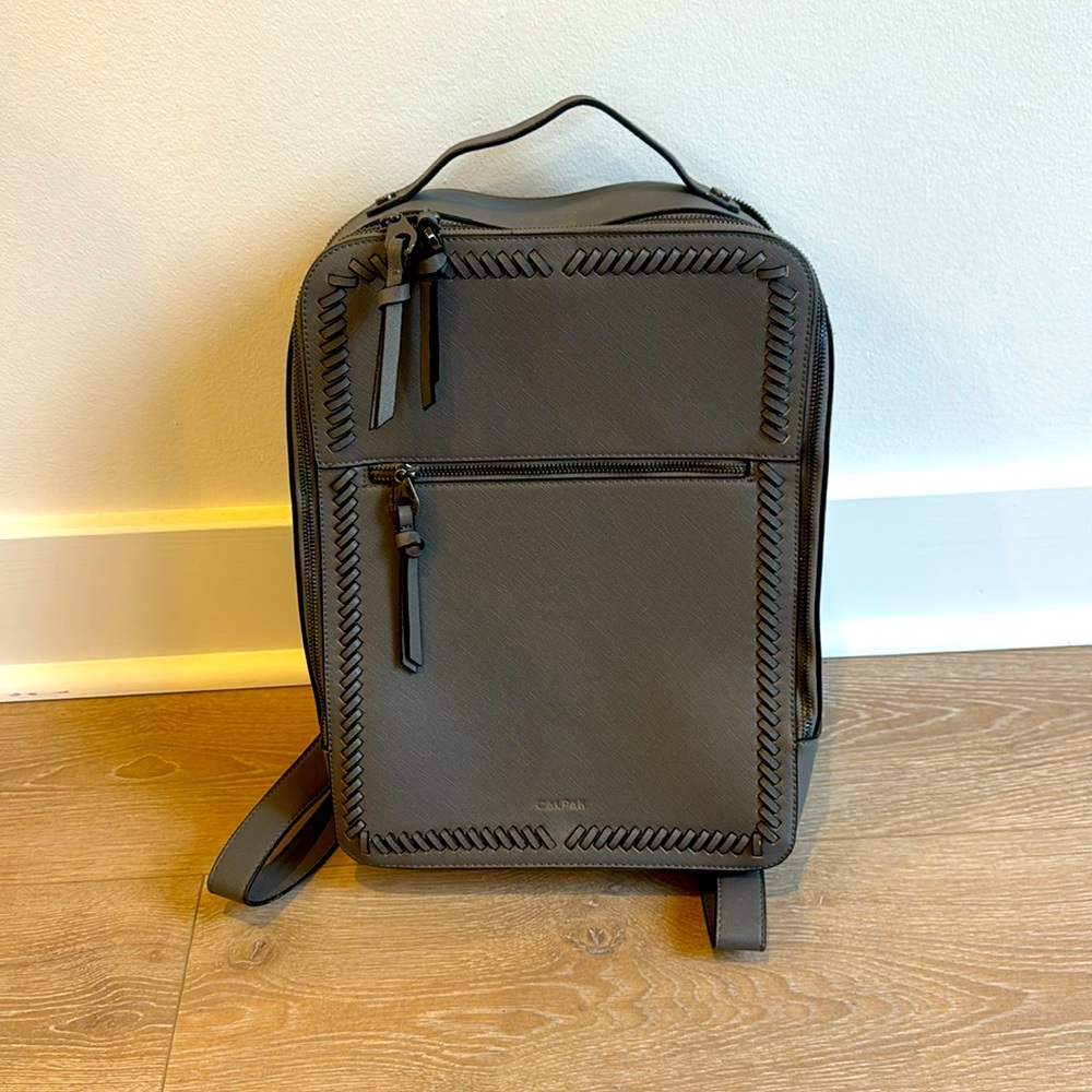 Grey calpak laptop backpack